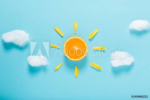 Picture of Orange slice as the sun concept
